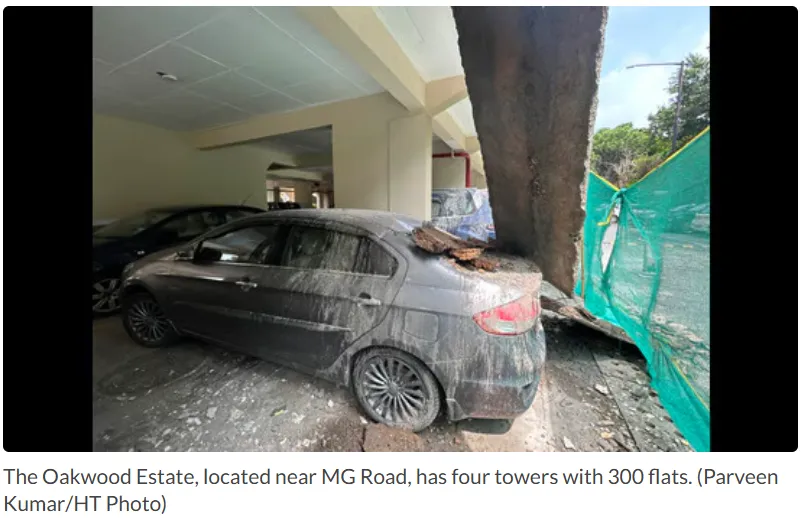 Concrete slab falls on two cars at DLF condominium
